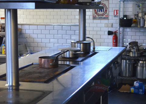 Commercial kitchen with stainless steel surfaces